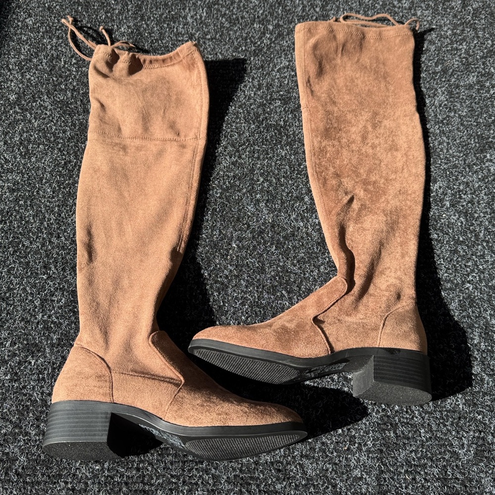 Over the knee tie back boots